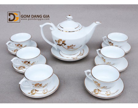 Bộ ấm trà quà tặng, dáng thần đèn chỉ vàng kim vẽ hoa. Bộ ấm trà quà tặng, dáng thần đèn chỉ vàng kim vẽ hoa.